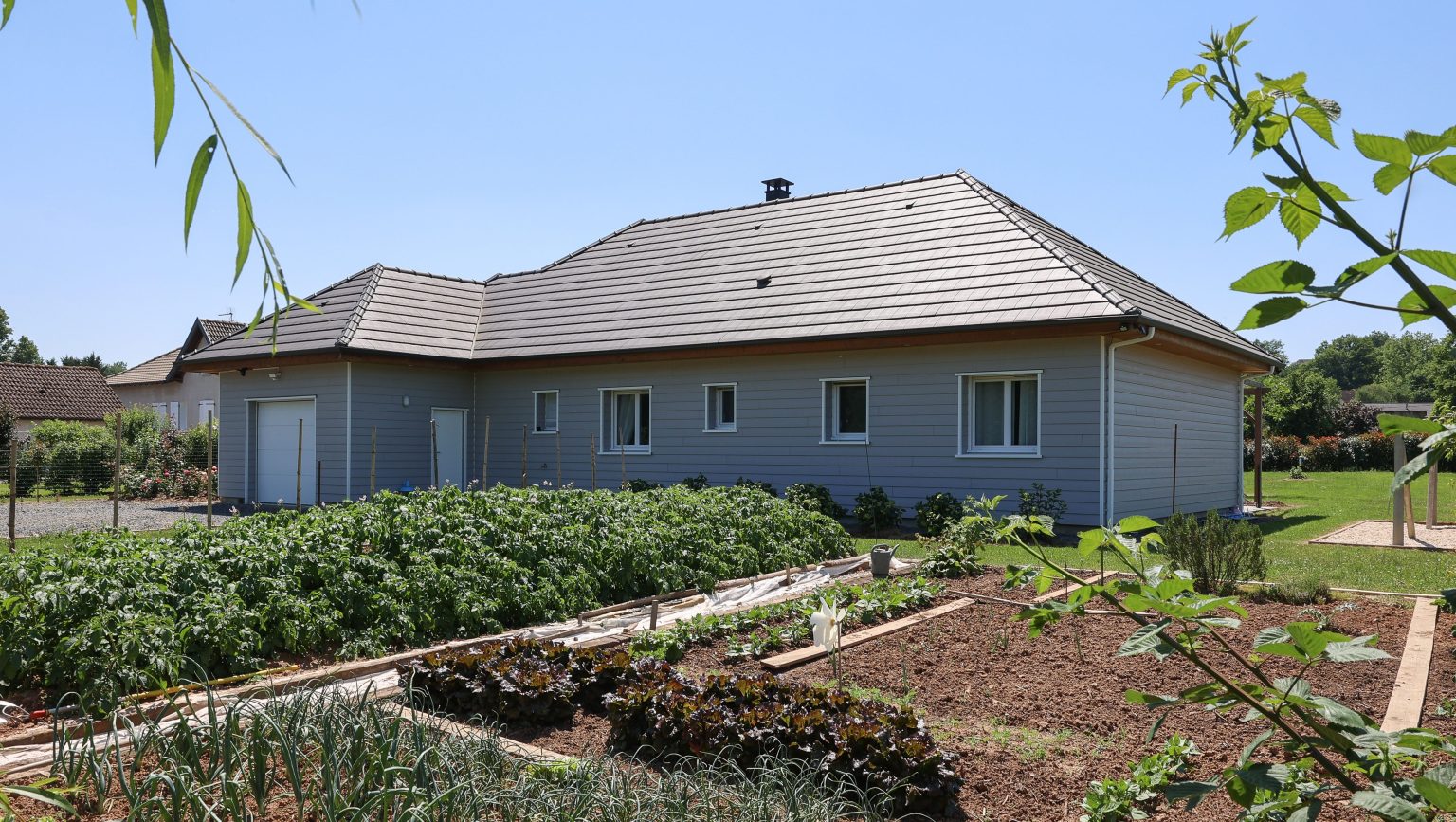 Bardage composite horizontal d'une maison ossature bois en Corrèze